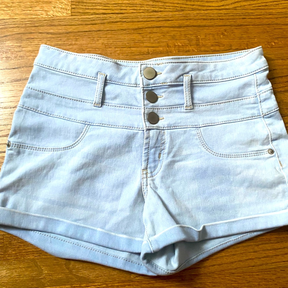Both shorts are size 9 and/or medium different shades of blue and mid rise